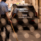 Members of the Minneapolis Police Department seen through a chain link gate on June 13, 2020 in Minneapolis, Minnesota. The MPD has been under scrutiny from residents and local city officials after the death of George Floyd in police custody on May 25.